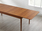 Erikka_Dining-Room_Table_GE0001AM_Erikka-110-Double-Leaves-Extension-Dining-Table-Amber_Amber_IMG_05_dae438aa-3d6e-4b13-aa7d-13dd2b3bfbcd